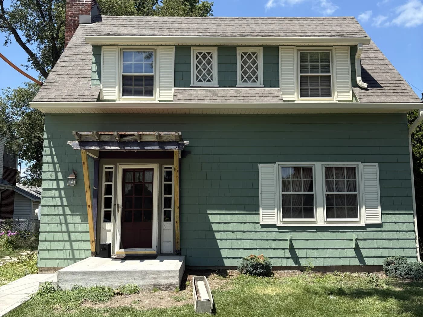 House exterior after painting — clean, uniform, fresh coat